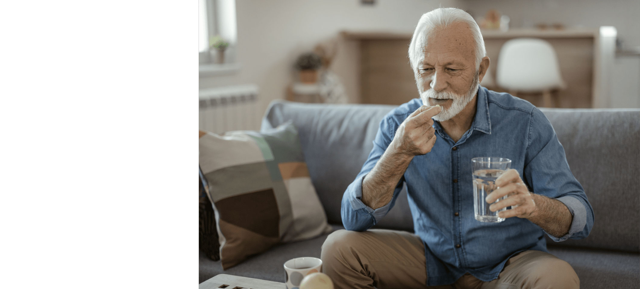 older man taking medication
